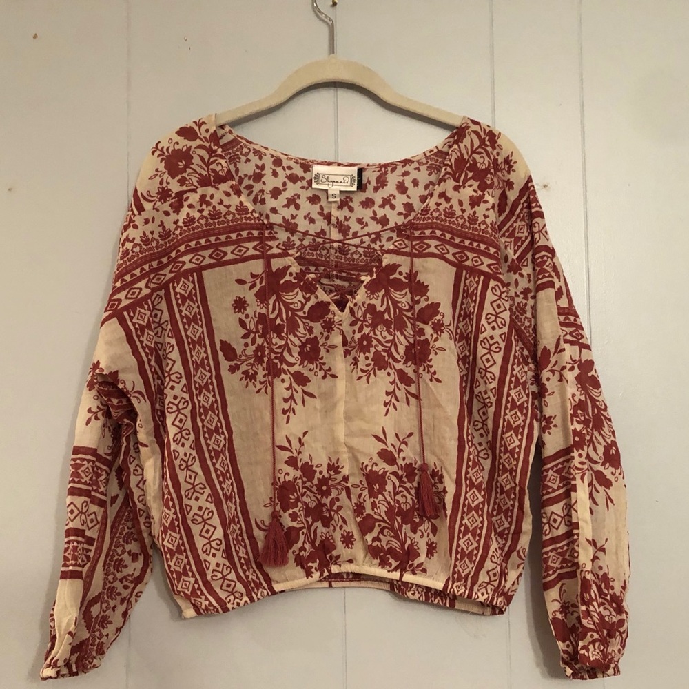 Flowing midriff cinched midlength shirt